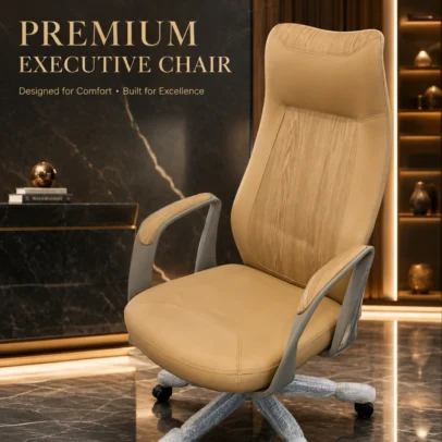 Elevate your office interior with the Premium Designer High Back Executive Office Chair, a perfect blend of luxury aesthetics, ergonomic comfort, and professional functionality. Crafted with premium upholstery and a refined contemporary design, this executive chair is ideal for directors, managers, consultants, and professionals who seek superior comfort and an impressive workspace appearance. The ergonomic high-back structure provides excellent support to the neck, shoulders, and lower back, helping maintain proper posture during long working hours. The generously padded seat and backrest ensure exceptional comfort throughout the day, while the integrated headrest area offers enhanced neck support. Featuring stylish designer armrests with premium finishing, a smooth height-adjustable mechanism, and a 360-degree swivel base with durable caster wheels, this chair allows effortless movement and flexibility in executive environments. The sturdy metal base provides excellent stability and long-term durability, making it suitable for daily professional use. With its sophisticated finish and modern executive styling, this chair is a perfect addition to executive cabins, corporate offices, boardrooms, premium workstations, and luxury home offices. Key Features Ergonomic high-back executive design Premium upholstered seat and backrest Integrated headrest support Designer armrests with premium finish Thick cushioning for long-hour comfort 360° swivel functionality Height-adjustable seating mechanism Durable metal base Smooth rolling caster wheels Strong and stable construction for daily office use Ideal For Executive cabins Director rooms CEO offices Manager cabins Corporate offices Boardrooms Premium workstations Luxury home offices SEO Keywords Executive office chair, designer office chair, high back executive chair, boss chair, luxury office chair, director office chair, ergonomic executive chair, manager chair, premium office chair, swivel office chair, cushioned office chair, modern executive seating.