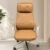 Add a touch of sophistication to your workspace with the Luxury Quilted High Back Executive Office Chair, crafted for professionals who value premium comfort and elegant design. Featuring a beautifully quilted upholstered backrest and headrest, this chair delivers a luxurious seating experience while enhancing the aesthetics of executive offices and corporate interiors. The ergonomic high-back structure supports the neck, shoulders, and lower back, helping maintain proper posture during extended working hours. The integrated cushioned headrest provides superior neck support, while the generously padded seat ensures exceptional comfort throughout the day. Designed for smooth movement and flexibility, this executive chair includes a 360-degree swivel mechanism, height-adjustable seat control, and durable caster wheels for effortless mobility. The sturdy chrome-finish metal base offers excellent stability and long-lasting durability, making it ideal for daily professional use. With its premium quilted detailing, modern armrest design, and refined contemporary appearance, this chair is perfectly suited for directors, CEOs, managers, consultants, and professionals seeking a luxurious office seating solution. Key Features Premium quilted upholstery design Ergonomic high-back support Integrated cushioned headrest Comfortable padded armrests Thick seat cushioning for long-hour comfort 360° swivel functionality Height-adjustable seating mechanism Durable chrome-finish metal base Smooth rolling caster wheels Strong and stable construction Ideal For Executive cabins Director rooms CEO offices Manager cabins Corporate offices Boardrooms Luxury home offices SEO Keywords Luxury executive office chair, quilted office chair, high back executive chair, boss chair, premium office chair, director office chair, ergonomic office chair with headrest, CEO chair, manager chair, swivel executive chair, cushioned office chair, modern luxury office seating.