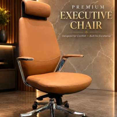 Upgrade your workspace with the Premium High Back Executive Office Chair with Headrest, designed to deliver exceptional comfort, executive style, and long-lasting performance. Crafted with a luxurious cushioned seat and backrest, this chair provides superior support during extended working hours while adding a sophisticated look to modern office interiors. The ergonomic high-back design supports the neck, shoulders, and lower back, helping maintain proper posture and reduce fatigue throughout the day. A generously padded headrest offers additional neck comfort, making this chair ideal for executives, directors, managers, and professionals who spend long hours at their desks. Featuring premium padded armrests, a smooth height-adjustable mechanism, and a 360-degree swivel base with durable rolling wheels, this executive chair ensures effortless mobility and flexibility in any workspace. The sturdy metal base enhances stability and durability, making it suitable for daily commercial office use. With its elegant contemporary design and premium upholstery finish, this chair is a perfect addition to executive cabins, boardrooms, corporate offices, director rooms, and luxury home offices. Key Features Ergonomic high-back executive design Premium cushioned headrest for neck support Soft padded armrests for enhanced comfort Thick seat cushioning for long working hours Smooth 360° swivel mechanism Height-adjustable seating Durable metal base with rolling casters Sturdy and long-lasting construction Elegant luxury office appearance Ideal For Executive cabins Director rooms CEO and manager offices Corporate offices Boardrooms Premium workstations Home executive offices SEO Keywords Executive office chair, high back office chair, boss chair, luxury office chair, ergonomic executive chair, director office chair, manager chair, office chair with headrest, premium office chair, swivel executive chair, cushioned office chair, modern executive seating.