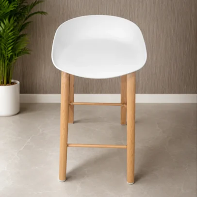 Add a touch of modern elegance to your reception or visitor area with the Modern Nordic Reception Chair with Wood Finish Metal Legs. Designed with a smooth ergonomic molded seat and durable metal legs featuring a natural wood-look finish, this chair combines contemporary aesthetics with everyday functionality. The curved seat provides comfortable support for guests, visitors, and clients during extended sitting periods. Its lightweight yet sturdy construction makes it easy to move while ensuring long-lasting performance in office, reception, and commercial environments. The wood-finish metal legs offer the warm appearance of wood with the strength and durability of metal, making this chair suitable for high-traffic areas. Its clean Scandinavian-inspired design blends seamlessly with modern offices, reception counters, waiting lounges, meeting rooms, cafes, restaurants, and home workspaces. Easy to clean and maintain, this reception chair is an excellent choice for businesses seeking stylish and reliable visitor seating. Key Features Modern Scandinavian-inspired design Ergonomic molded seat for comfortable sitting Integrated arm support Durable molded plastic shell Strong metal legs with wood finish coating Reinforced support bars for stability Lightweight and easy to move Easy-to-clean surface Long-lasting commercial-grade construction Ideal For Reception areas Visitor lounges Waiting rooms Office reception spaces Meeting rooms Cafes and restaurants Home offices Contemporary commercial interiors SEO Keywords Reception chair, visitor chair, Nordic reception chair, Scandinavian visitor chair, molded plastic chair, wood finish metal leg chair, modern reception seating, waiting room chair, office visitor chair, contemporary reception chair, cafe chair, minimalist visitor seating.