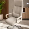 Enhance your executive workspace with the Premium Ergonomic High Back Executive Office Chair, crafted to deliver exceptional comfort, professional elegance, and long-lasting performance. Featuring a sleek high-back silhouette with integrated headrest support, this chair provides superior ergonomic comfort while complementing modern office interiors. The generously cushioned seat and backrest support the neck, shoulders, and lower back, helping maintain healthy posture and reducing fatigue during extended working hours. The integrated headrest offers enhanced neck support, while the softly padded armrests ensure relaxed arm positioning for improved productivity and comfort. Designed for everyday professional use, this executive chair includes a smooth height-adjustable mechanism, 360-degree swivel functionality, and durable caster wheels for effortless movement across office floors. The sturdy chrome-finish metal base provides excellent stability, strength, and long-term durability, making it ideal for demanding corporate environments. With its refined contemporary design and premium upholstery finish, this chair is perfectly suited for executive cabins, director rooms, boardrooms, corporate offices, premium workstations, and luxury home offices. Key Features Ergonomic high-back executive design Integrated cushioned headrest support Premium upholstered seat and backrest Comfortable padded armrests Thick cushioning for long-hour comfort 360° swivel functionality Height-adjustable seating mechanism Durable chrome-finish metal base Smooth rolling caster wheels Strong and stable construction for professional use Ideal For Executive cabins Director rooms CEO offices Manager cabins Corporate offices Boardrooms Premium workstations Luxury home offices SEO Keywords Premium executive office chair, ergonomic high back office chair, boss chair, luxury office chair, director office chair, manager chair, office chair with headrest, executive swivel chair, cushioned office chair, corporate office chair, modern executive seating, premium boss chair.