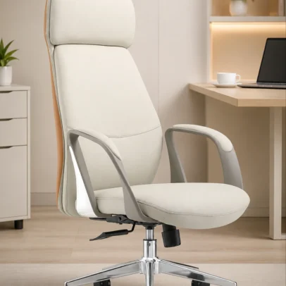 Create a sophisticated executive workspace with the Premium High Back Executive Office Chair, designed for superior comfort, professional performance, and timeless elegance. Featuring a sleek high-back profile with integrated headrest support, this chair offers excellent posture support while enhancing the appearance of modern office interiors. The ergonomic backrest supports the neck, shoulders, and lower back, helping reduce fatigue during extended working hours. The generously cushioned seat and backrest provide lasting comfort, making it an ideal choice for directors, managers, executives, consultants, and business professionals. Built for everyday office use, the chair includes a smooth height-adjustable mechanism, 360-degree swivel functionality, and durable caster wheels for effortless movement. The sturdy chrome-finish metal base ensures excellent stability and long-term durability, while the refined contemporary styling complements premium office cabins, boardrooms, and luxury home offices. With its clean executive design and premium upholstery finish, this chair delivers the perfect balance of comfort, functionality, and executive presence. Key Features Ergonomic high-back executive design Integrated cushioned headrest support Premium upholstered seat and backrest Comfortable fixed armrests Thick cushioning for long-hour comfort 360° swivel functionality Height-adjustable seating mechanism Durable chrome-finish metal base Smooth rolling caster wheels Strong and stable construction for professional use Ideal For Executive cabins Director rooms CEO offices Manager cabins Corporate offices Boardrooms Premium workstations Luxury home offices SEO Keywords Premium executive office chair, high back office chair, boss chair, luxury office chair, director office chair, ergonomic executive chair, manager chair, office chair with headrest, executive swivel chair, cushioned office chair, modern executive seating, corporate office chair.