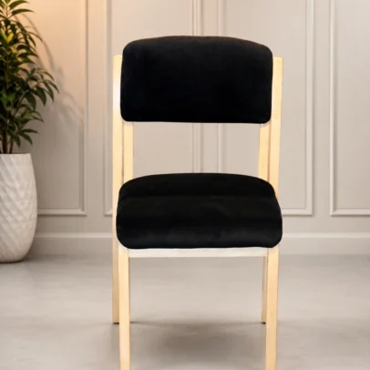 Modern Upholstered Visitor Chair with Wooden Finish Metal Frame for Offices, Reception & Commercial Spaces Create a welcoming and professional seating environment with the Modern Upholstered Visitor Chair with Wooden Finish Metal Frame. Designed for comfort, durability, and contemporary style, this premium visitor chair is an ideal seating solution for office receptions, waiting areas, conference rooms, meeting spaces, cafés, hotels, educational institutions, and modern commercial interiors. The chair features a generously padded seat and backrest upholstered in premium velvet fabric, providing a soft and comfortable seating experience. Its ergonomic backrest offers excellent support for the lower and middle back, making it suitable for extended meetings, waiting areas, guest seating, and everyday office use. The elegant black upholstery adds a sophisticated touch to any interior while complementing a wide range of office furniture and décor styles. Whether placed in a corporate reception, executive office, meeting room, or hospitality space, this chair enhances the overall appearance with its clean lines and modern aesthetic. Built for long-lasting performance, the chair is supported by a heavy-duty steel frame finished with a premium wood-grain coating. While the frame has the natural appearance of wood, it is constructed from durable metal, offering superior strength, stability, and resistance to everyday wear. This combination provides the beauty of wooden furniture with the reliability of commercial-grade steel. The compact design allows efficient use of space while maintaining excellent seating comfort. Anti-slip leg protectors help safeguard flooring from scratches and improve stability on different surfaces. Manufactured using high-quality materials and precision craftsmanship, this chair is suitable for high-traffic commercial environments as well as residential applications. Its sturdy construction ensures reliable performance with minimal maintenance. Whether you are furnishing an office reception, conference room, waiting lounge, hotel lobby, café, training center, or home office, the Modern Upholstered Visitor Chair with Wooden Finish Metal Frame offers the perfect balance of comfort, durability, and timeless elegance. Upgrade your seating area with a chair that combines premium upholstery, commercial-grade construction, and contemporary design to create a welcoming experience for every guest. Key Features Premium Upholstered Seat & Backrest Soft Velvet Fabric Finish Heavy-Duty Metal Frame Elegant Wood-Grain Finish on Metal Legs Ergonomic Back Support Thick High-Density Foam Cushion Modern Minimalist Design Durable Commercial-Grade Construction Scratch-Resistant Frame Anti-Slip Floor Protectors Easy to Clean & Maintain Suitable for Commercial & Residential Use SEO Keywords Visitor Chair Reception Chair Office Visitor Chair Upholstered Visitor Chair Conference Chair Waiting Room Chair Office Reception Chair Guest Chair Commercial Visitor Chair Velvet Office Chair Wooden Finish Metal Chair Modern Visitor Seating Office Furniture Waiting Area Chair Executive Visitor Chair