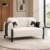 Modern two-seater sofa with cream upholstery and black accents Cream modern sofa with black legs for contemporary interiors Two-seater sofa with textured cream upholstery and black side detailing Modern sofa furniture by Global Star Furniture in Ghaziabad Contemporary cream sofa with black cylindrical legs and cushions