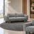 Modern grey two-seater sofa with cushioned seats Grey upholstered two-seater sofa with cylindrical legs Modern grey sofa with two back cushions and broad armrests Contemporary two-seater sofa by Global Star Furniture Grey modern sofa furniture manufacturer in Ghaziabad