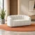 Modern cream fabric sofa with channel tufted back Contemporary upholstered sofa with rounded arms Modern fabric sofa for living room and office Channel tufted cream sofa by Global Star Furniture Modern sofa manufacturer in Ghaziabad with textured fabric finish