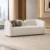 Modern cream fabric sofa with curved edges Contemporary cream sofa with stylish cushions Modern upholstered sofa for living room Cream fabric sofa by Global Star Furniture Modern sofa manufacturer in Ghaziabad