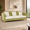Modern green fabric sofa with cushions and wooden legs Contemporary green sofa with three light cushions Modern fabric sofa for home living room and lounge Green upholstered sofa by Global Star Furniture Modern sofa manufacturer in Ghaziabad with wooden legs