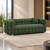 Deep tufted green fabric sofa with cushioned arms Modern green tufted sofa with textured fabric finish Contemporary green fabric sofa for lounge and home Deep tufted upholstered sofa by Global Star Furniture Green modern sofa manufacturer in Ghaziabad