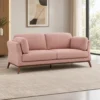Modern pink fabric sofa with wooden legs Blush pink upholstered sofa with cushions Modern living room sofa with rounded armrests Contemporary pink fabric sofa by Global Star Furniture Pink sofa manufacturer in Ghaziabad with wooden legs