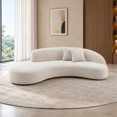 Modern curved fabric sofa in cream colour Contemporary curved sofa with rounded backrest Cream upholstered modern sofa with cushions Modern curved living room sofa by Global Star Furniture Contemporary fabric sofa manufacturer in Ghaziabad