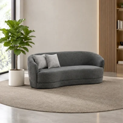 Modern curved 3 seater sofa in dark grey fabric Contemporary grey sofa with rounded arms and backrest Modern three seater upholstered sofa with cushions Curved living room sofa by Global Star Furniture Dark grey modern sofa manufacturer in Ghaziabad