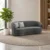 Modern curved 3 seater sofa in dark grey fabric Contemporary grey sofa with rounded arms and backrest Modern three seater upholstered sofa with cushions Curved living room sofa by Global Star Furniture Dark grey modern sofa manufacturer in Ghaziabad
