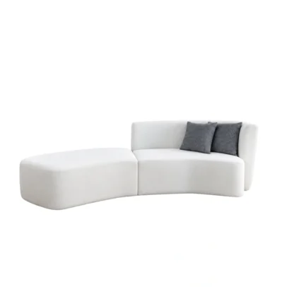 Modern curved modular sofa with chaise in white upholstery Contemporary white sofa with curved chaise section Modern modular living room sofa with checked cushions Curved upholstered sofa by Global Star Furniture Modern modular sofa manufacturer in Ghaziabad