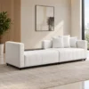 Modern modular sofa with chaise in cream fabric Contemporary sectional sofa with vertical channel upholstery Cream modular living room sofa with three cushions Modern sofa with chaise by Global Star Furniture Modular sectional sofa manufacturer in Ghaziabad